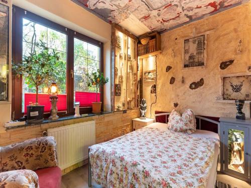 Ένα ή περισσότερα κρεβάτια σε δωμάτιο στο Ferienhaus in Wismar mit eigener Terrasse