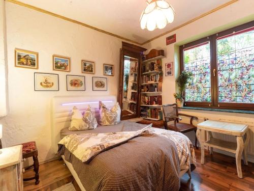 Ένα ή περισσότερα κρεβάτια σε δωμάτιο στο Ferienhaus in Wismar mit eigener Terrasse