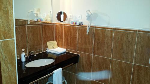 Phòng tắm tại Hotel Restaurant Am Pfauenhof