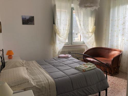 Tempat tidur dalam kamar di Casa del Dottore