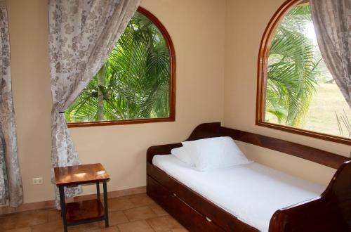 Cama ou camas em um quarto em Hotel Costa Coral