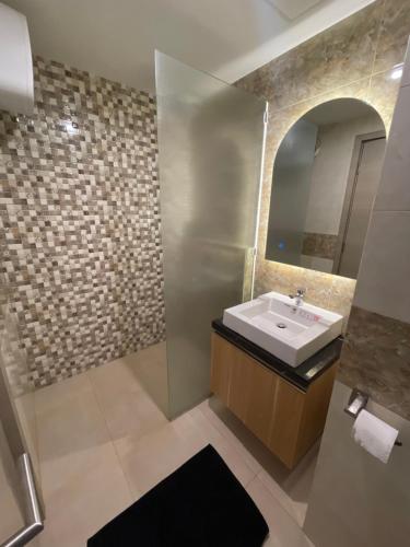 Koupelna v ubytování The yudhistira apartment