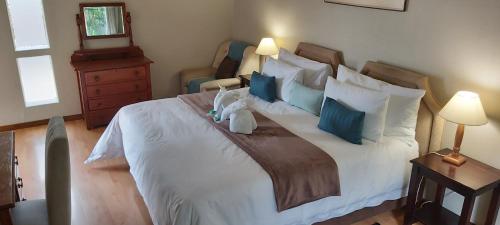 Letto o letti in una camera di Rockview Lodge