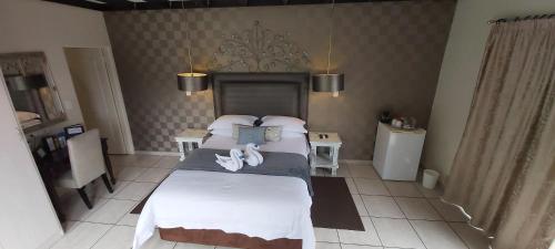 Letto o letti in una camera di Rockview Lodge
