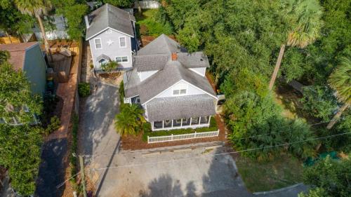 an overhead view of a large house with a yard at Historic Tremain Cottages in Mount Dora