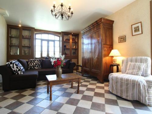 a living room with a couch and a table at Gîte Bournoncle-Saint-Pierre, 4 pièces, 6 personnes - FR-1-582-278 