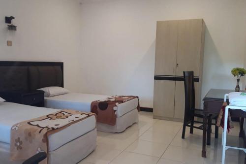 Billede fra billedgalleriet på KoolKost At Tenggilis - Minimum Stay 30 Nights i Tenggilismedjojo