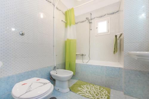 Koupelna v ubytování Green Island Apartment