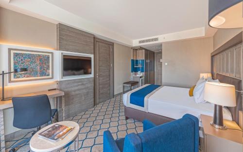 Letto o letti in una camera di Holiday Inn Kayseri - Duvenonu by IHG