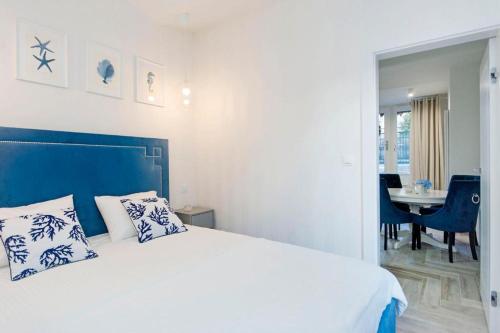 Posteľ alebo postele v izbe v ubytovaní Apartamenty na Uphagena