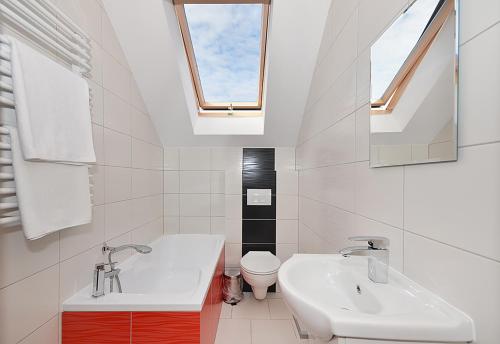 Koupelna v ubytování Apartamenty Tęczowe