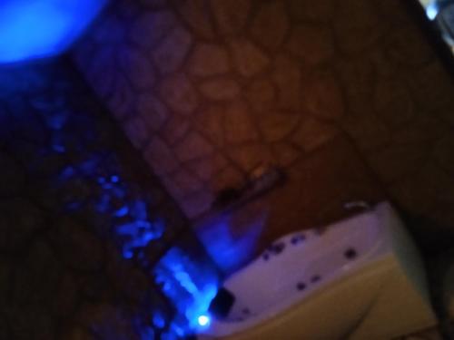 a blurry picture of a bathroom with a tub at To Konaki in Synikia Mesi Trikalon