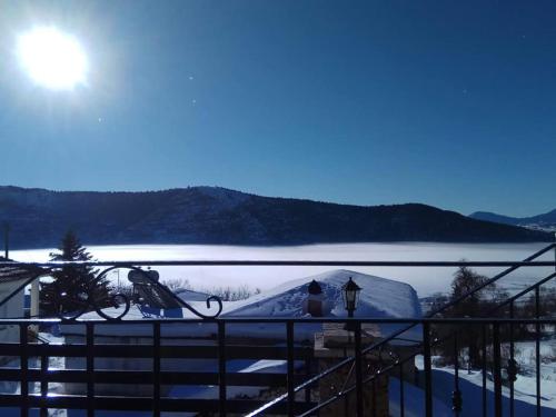 a view of a snow covered igloo from a balcony at Angelic in the mountains in Kaisárion