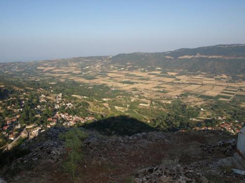 a view of a city from the top of a mountain at Angelic in the mountains in Kaisárion