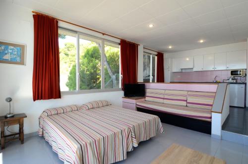 A bed or beds in a room at Nautic BX-4