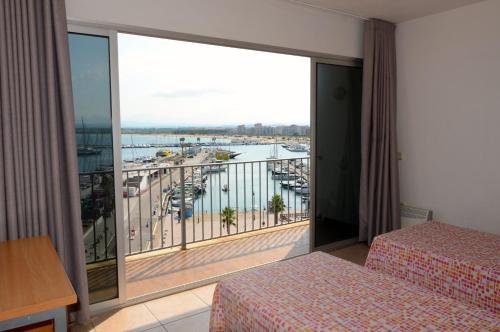 Postel nebo postele na pokoji v ubytování Nautic 3-2