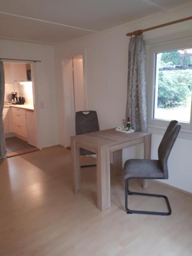 Kuchyň nebo kuchyňský kout v ubytování Ferienhaus am Langen See III