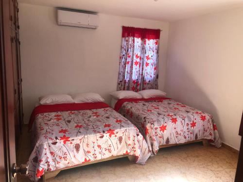 Ένα ή περισσότερα κρεβάτια σε δωμάτιο στο Hotel Galsi