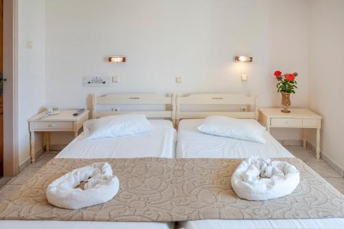 Postel nebo postele na pokoji v ubytování Hotel Koala
