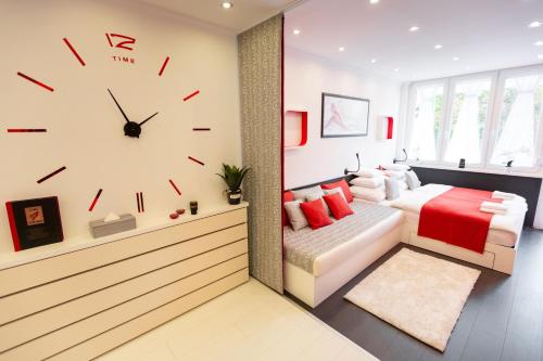 Postel nebo postele na pokoji v ubytování Flame Luxus Apartman
