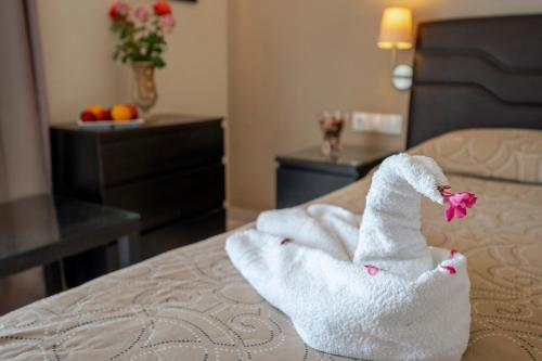 Cama o camas de una habitación en Hotel Koala