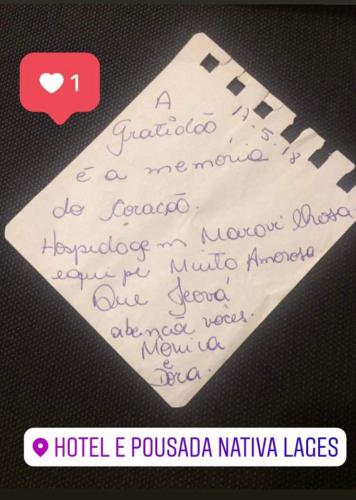 a piece of paper with writing on it at Pousada Nativa Lages in Lages