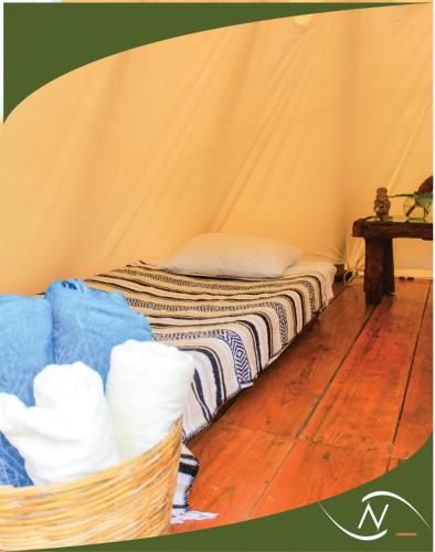 Cama o camas de una habitación en Tipis Cuetzalan