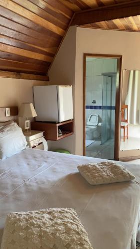 Katil atau katil-katil dalam bilik di Pousada Villa Di Carpi