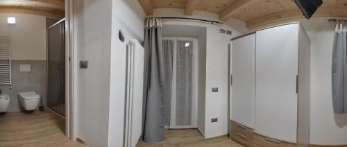 Kúpeľňa v ubytovaní Appartamento Profumo di Legno 022139-AT-010022