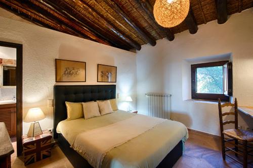 Ένα ή περισσότερα κρεβάτια σε δωμάτιο στο Mas Arnau - Luxury Villa & Relax