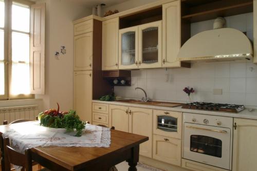 Kuchyň nebo kuchyňský kout v ubytování Bio Agriturismo Mare in Campagna