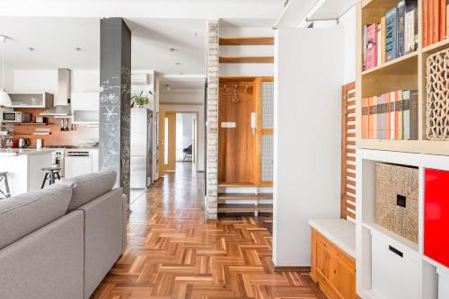 A kitchen or kitchenette at Relax Into Loft Living At A Light-Filled City Escape