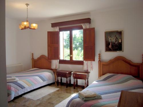 En eller flere senger på et rom på Villa Antonia