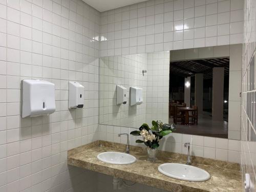 Ett badrum på Paraiso Barra Hotel