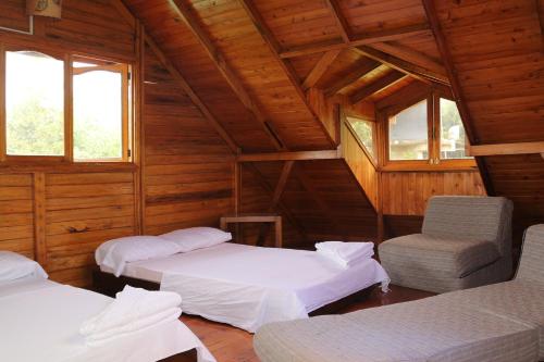 Postel nebo postele na pokoji v ubytování Finca Chalet La Tawa