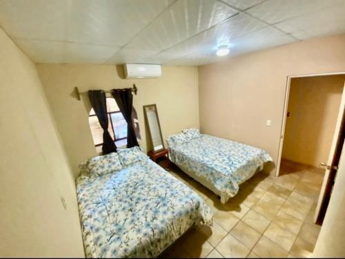 Ein Bett oder Betten in einem Zimmer der Unterkunft INN-HOUSE