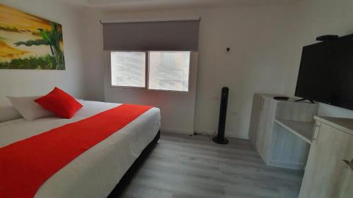 Katil atau katil-katil dalam bilik di Hotel San Jeronimo Armenia