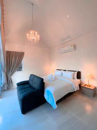 Letto o letti in una camera di La Maison Blanche Chiang Rai Resort