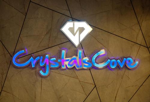 a neon sign that reads crisis love on a floor at Hotel Crystals Cove in Thekkady