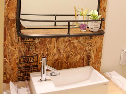 Ένα μπάνιο στο Guesthouse ushiyado