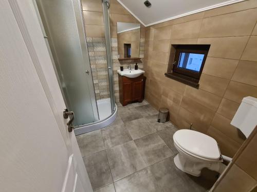 Kylpyhuone majoituspaikassa Vila Sia
