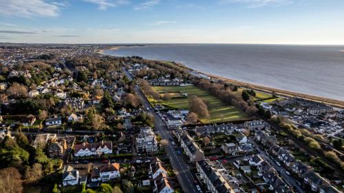 an aerial view of a town next to the water at Casa Fresa - Orchar Suites in Broughty Ferry