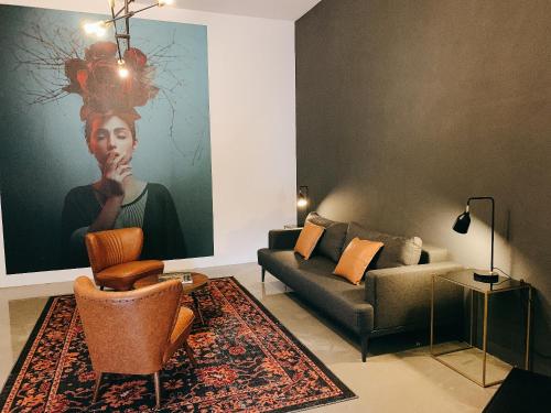 Ein Sitzbereich in der Unterkunft GOHO Loft
