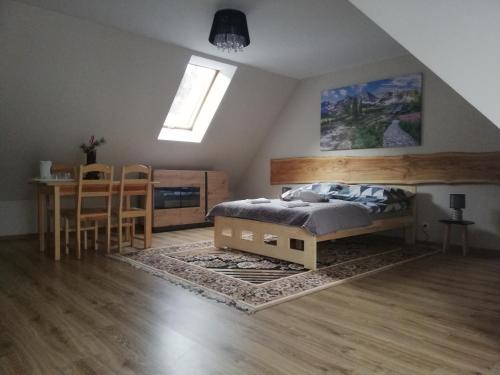 Letto o letti in una camera di Pokoje "U Ani"