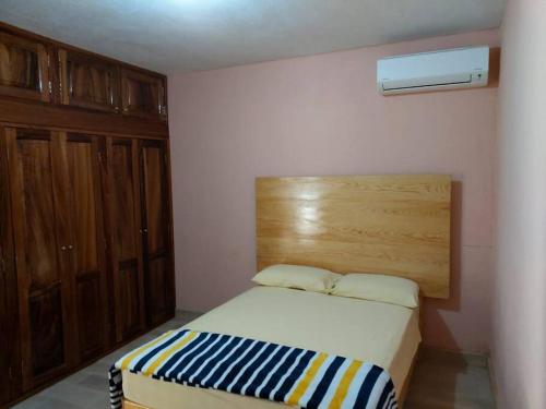 Postel nebo postele na pokoji v ubytování Playa Azul, Michoacán Casa&SolMarena