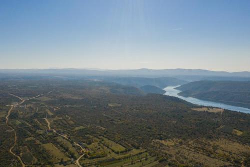 an aerial view of a river and forests at Anica&Jaglica in Brištane