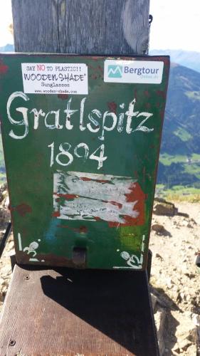 a sign on the top of a mountain at Haus Theresia in Alpbach