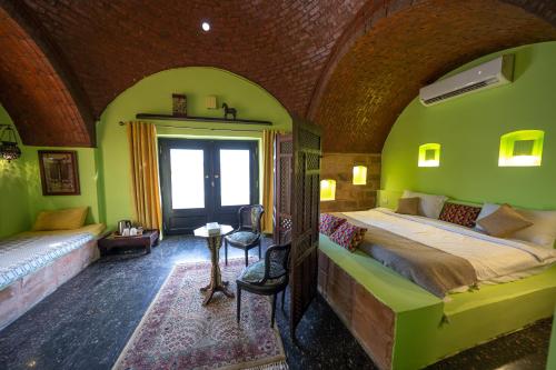 Postel nebo postele na pokoji v ubytování Anakato Nubian Experience