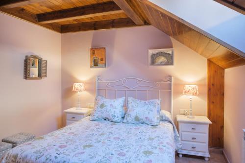 Postel nebo postele na pokoji v ubytování El Rincón de Andrea Apartamentos