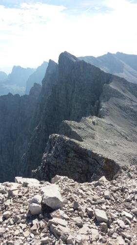 a view of a rocky mountain with mountains in the background at Ferienwohnung mit wundervollen Bergblick in Lenggries